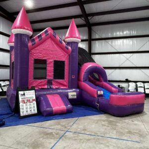 pink and purple inflatable castle combo bounce house with an attached slide